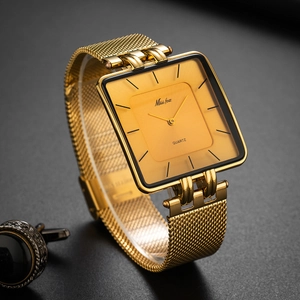 Classic gold square stainless steel mesh band quartz watch for men in luxury dark setting