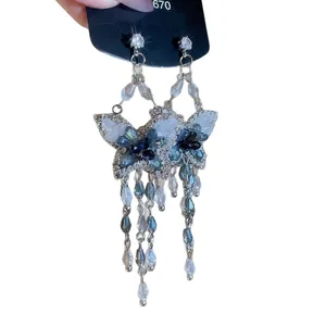 Boucles d'oreilles pendantes papillon en cristal avec strass bleus pour femmes