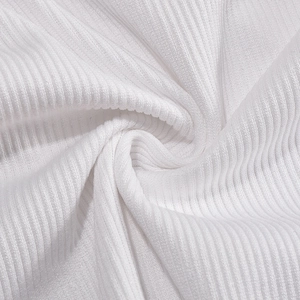 Close-up of white ribbed knit fabric texture showing high-quality cotton material details
