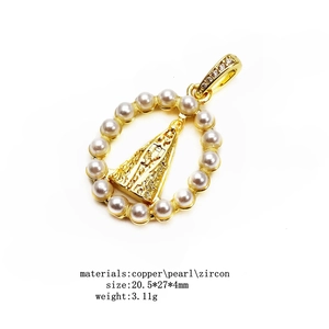 Detail of copper gold pendant with Our Lady of Aparecida, pearls and zircon inlay