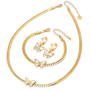 Golden butterfly jewelry set with shell inlay including necklace, bracelet and earrings