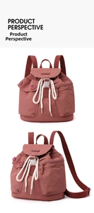 Detail showing dark pink nylon backpack with white drawstrings and side button pocket