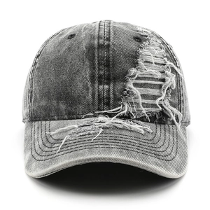 Vintage washed grey denim baseball cap with distressed ripped details and sun protection