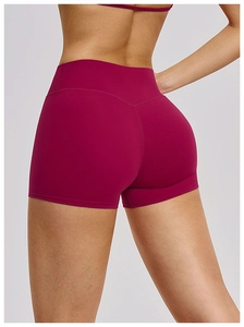 Vista posteriore dei pantaloncini yoga a vita alta rosso bacca con cuciture a V