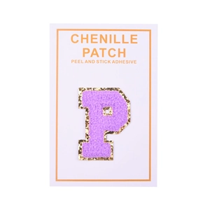 Detail of purple chenille letter P patch with gold glitter edge and adhesive backing