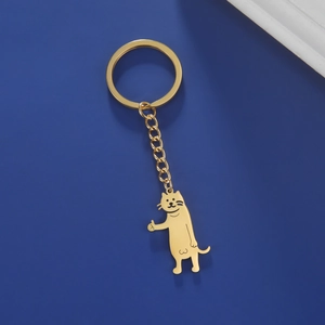 Detailed view of a gold stainless steel keychain featuring a cartoon cat with unique details