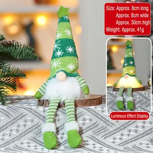 Gnome plush with glowing hat and snowflake knit pattern measuring 8x8x30cm