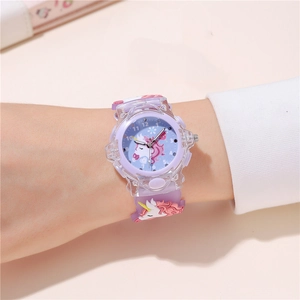 Close-up of kids quartz watch with 3D unicorn silicone strap and easy-to-read dial