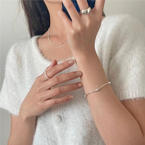 Minimalist S925 sterling silver bead bracelet and jewelry set styled on a model