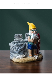 Detailed resin gnome beach base with two glass salt and pepper shakers for table decor