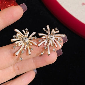 Sparkling Chinese New Year firework earrings with rhinestones and white enamel finish