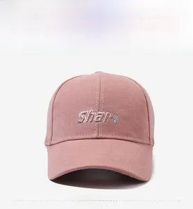 Close-up of pink cotton baseball cap featuring 3D embroidered Share text on the front
