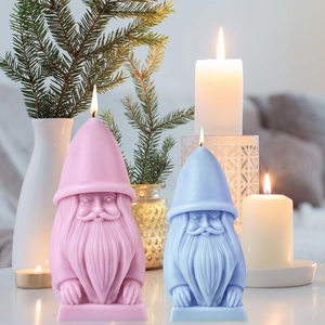 Gnome-shaped Christmas scented candles in pink and blue for DIY holiday gifts and decor