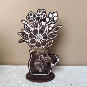 Detail of wooden flower cup ornament with MOM heart tag for Mother's Day home decor