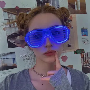 Close-up of blue LED shutter glasses worn by a person for party and festival events