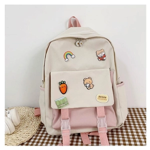 Close-up of pink and beige student backpack with cute badges and Bread Fomfom logo