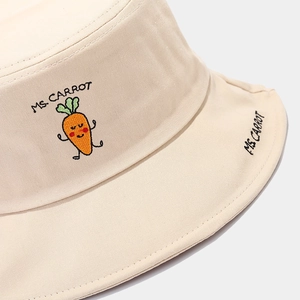 Minimalist beige cotton bucket hat with cute carrot embroidery and MS. CARROT text detail