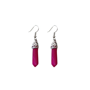 Detailed view of rose purple hexagonal crystal earrings with silver filigree tops