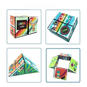 Detailed views of geometric 3D puzzle cube showing various folding shapes and patterns