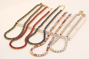Detail of 18K gold plated tennis chains with colorful cubic zirconia and lobster clasp
