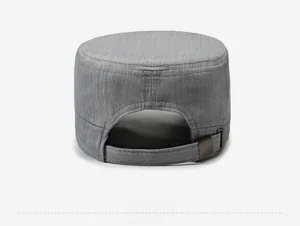 Detail view of the adjustable metal buckle and textured grey fabric on the flat top cap back