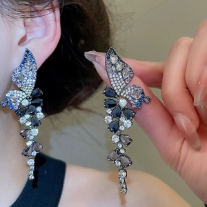 Luxurious silver needle butterfly drop earrings with blue zircon stones for women
