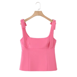 Pink tank top for women with bow shoulder straps and a minimalist solid color design