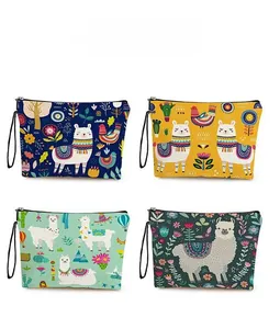 Detail display of alpaca pattern cosmetic bags with zipper closure and wrist straps