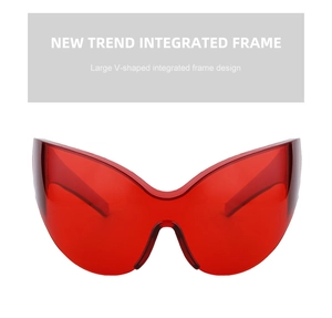 Close-up of red oversized V-shaped shield sunglasses with one-piece lens design