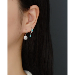 Bohemian S925 sterling silver evil eye hoop earrings with blue stones on model