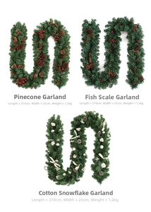 Close-up of 2.7m Christmas garlands with pine cones, red berries, and festive cotton balls