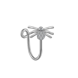 Detailed close-up of a silver spider nose ring with sparkling white rhinestones