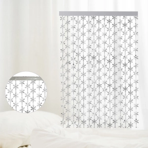 Detail of silver snowflake fringe curtain featuring reflective finish for Christmas party decor