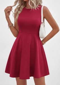 Detail of burgundy sleeveless A-line dress with high waist and textured fabric