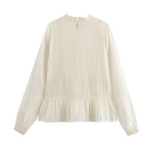 White cotton linen blouse for women with lace trim collar and ruffled hem details