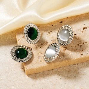 Retro oval stud earrings with woven silver texture and natural cat eye stone inlays