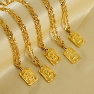 Men's 18K gold plated stainless steel square initial pendants with twist chains on silk