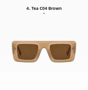 Close-up of stylish translucent brown square flat top sunglasses with dark lenses
