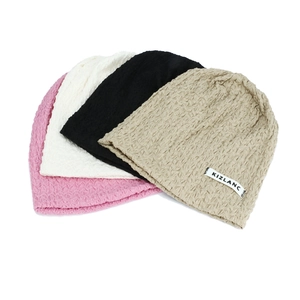 Four colors of breathable knitted slouchy beanies including pink, beige, black, and khaki