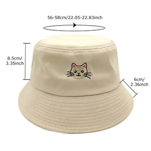Beige cotton bucket hat with cat embroidery and detailed size guide for head circumference