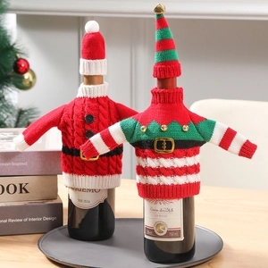 Festive Christmas knitted wine bottle cover set with red and green mini sweater and hat