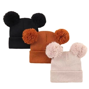 Kids rib-knit beanie set featuring double pom-poms in black, caramel, and light pink colors