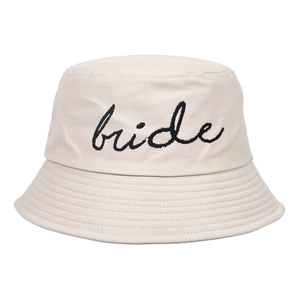 Detail of beige cotton canvas hat featuring black embroidered bride script lettering