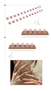 Detail of short square-oval french ombre press-on nails in pink and white gradient set