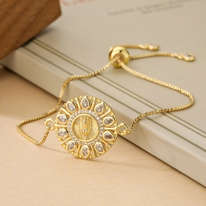 Adjustable gold plated bracelet with Virgin Mary pendant and white zircon halo