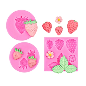 Pink silicone strawberry mold for chocolate and fondant cake decoration with leaf and flower