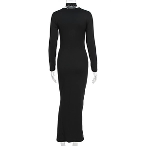Back view of a sleek black long-sleeved bodycon maxi dress with button neck detail