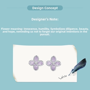 Detailed macro view of purple lilac stud earrings with silver edges on a sketch background