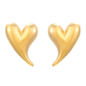 Macro shot of 18K gold plated heart earrings with streamlined asymmetrical profile