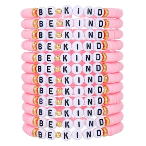 Pink Heishi bead bracelet set with BE KIND letter beads and gold accents in 12-piece stack